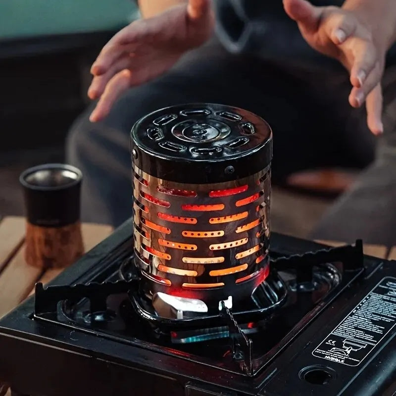Portable stove heater glowing on a camping stove