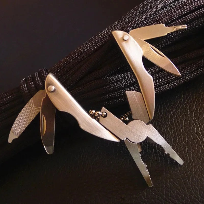 Multi-tool with knife and pliers open