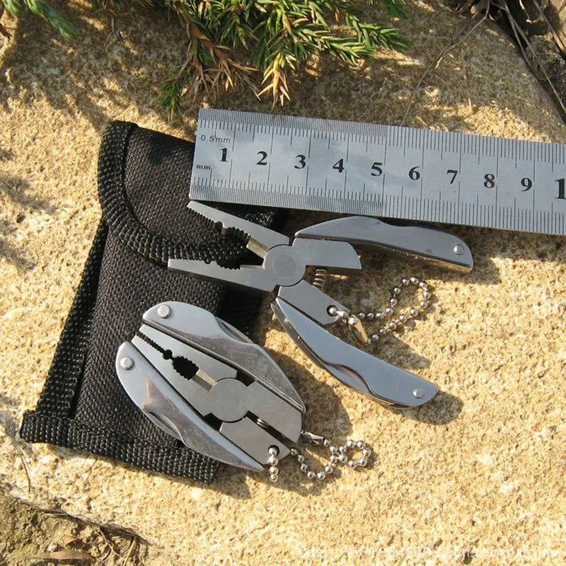 Multi-tool size next to a ruler with pouch