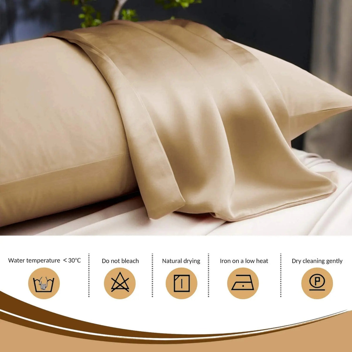 Copper satin pillowcase on a bed with care instructions